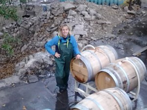 Filling the new barrels with water so the wood would swell, so it would later hold wine.